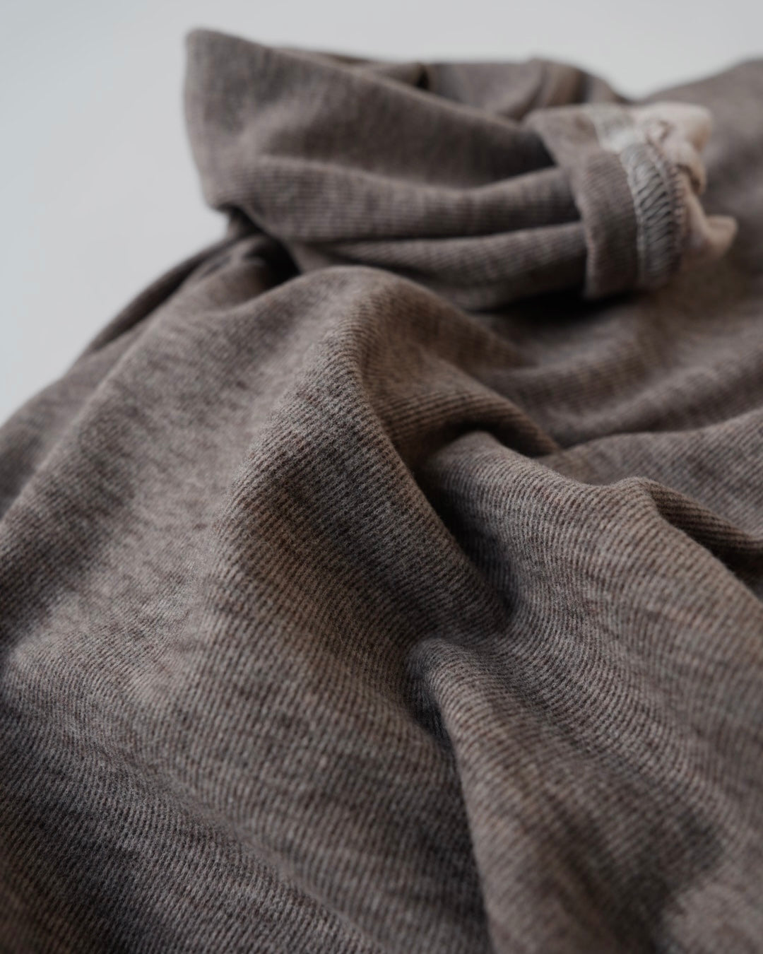 裏起毛モックネックトップス