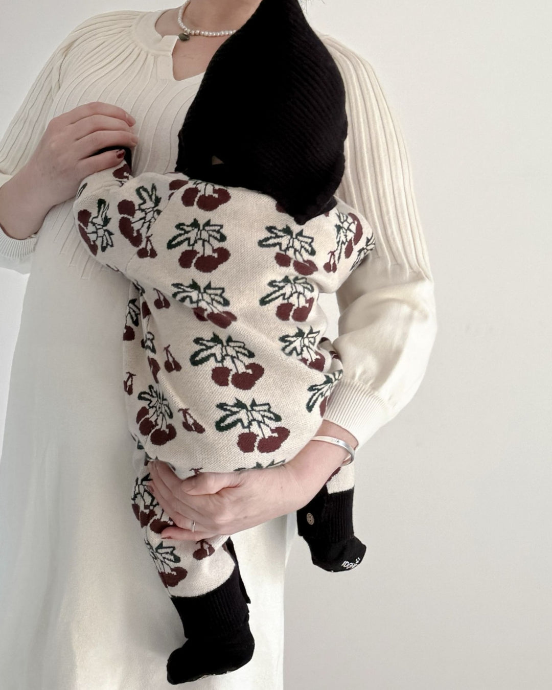 ジャガードニットロンパース