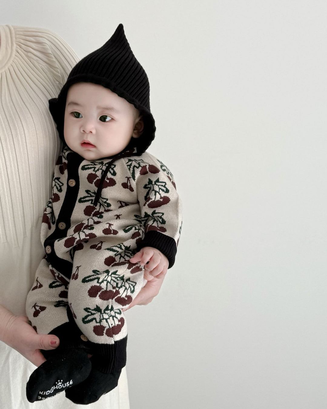 ジャガードニットロンパース