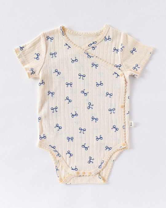 前開きアイレットリボンロンパース