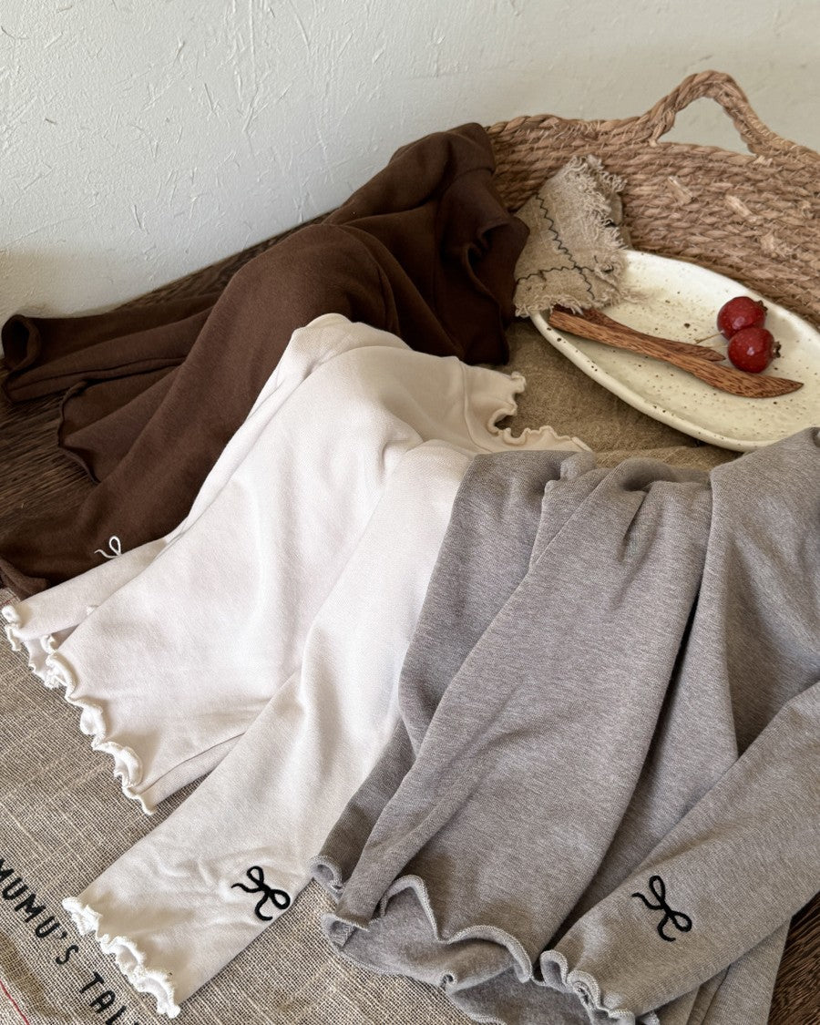 リボンステッチスムースメロウトップス