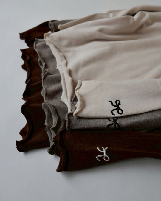 リボンステッチスムースメロウトップス