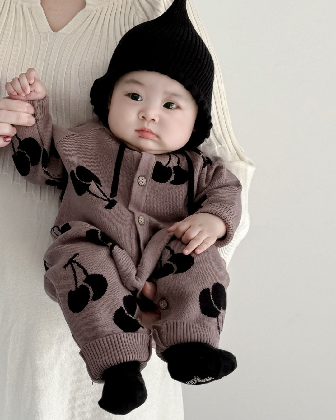 ジャガードニットロンパース