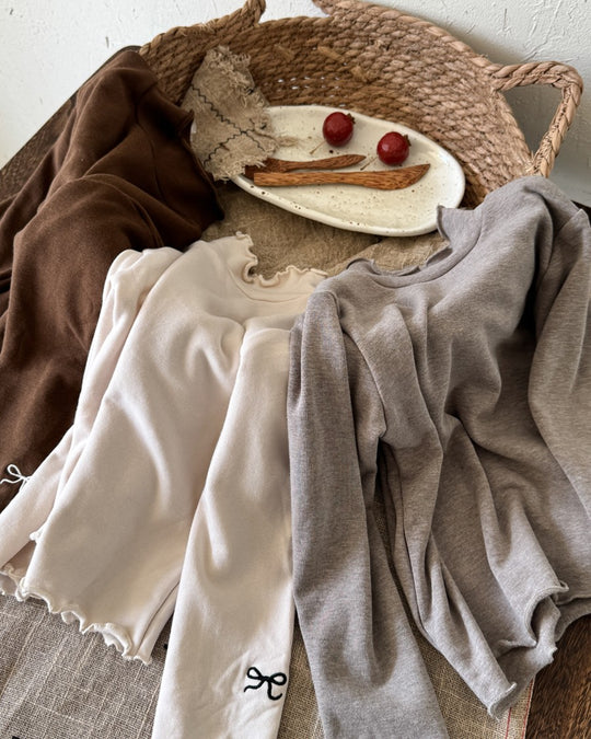 リボンステッチスムースメロウトップス