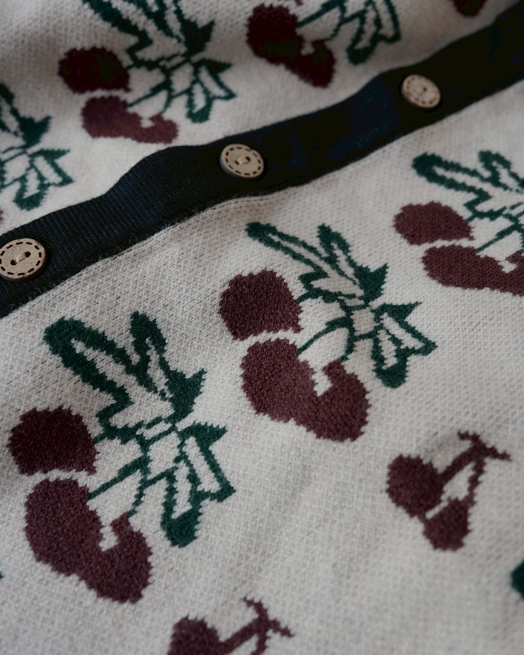 ジャガードニットロンパース