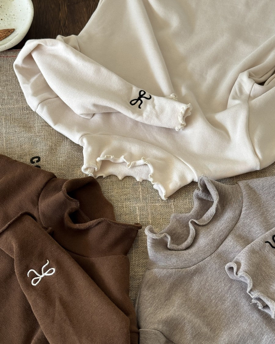 リボンステッチスムースメロウトップス