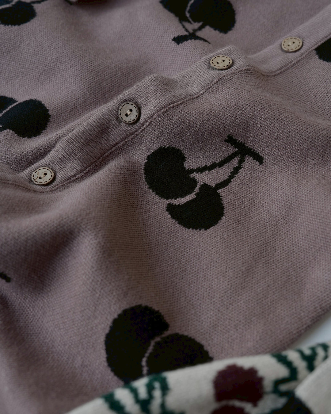 ジャガードニットロンパース