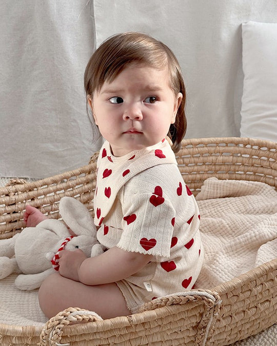 前開きアイレットリボンロンパース