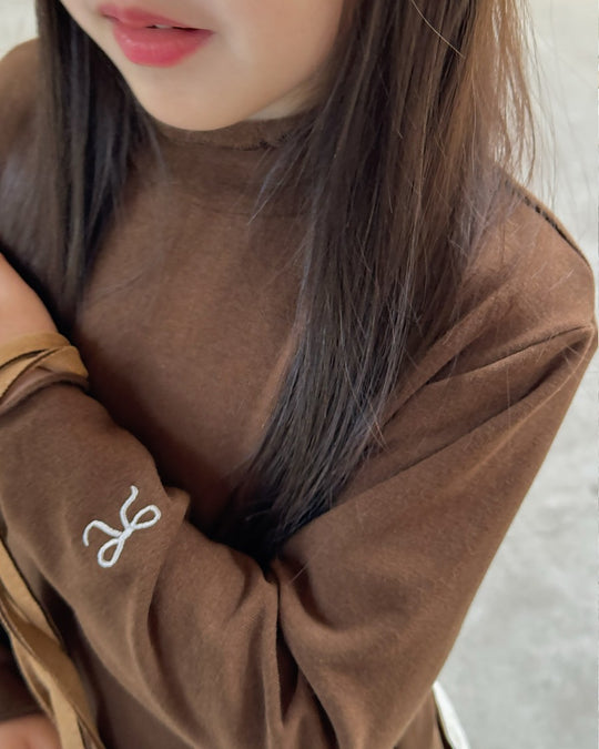 リボンステッチスムースメロウトップス