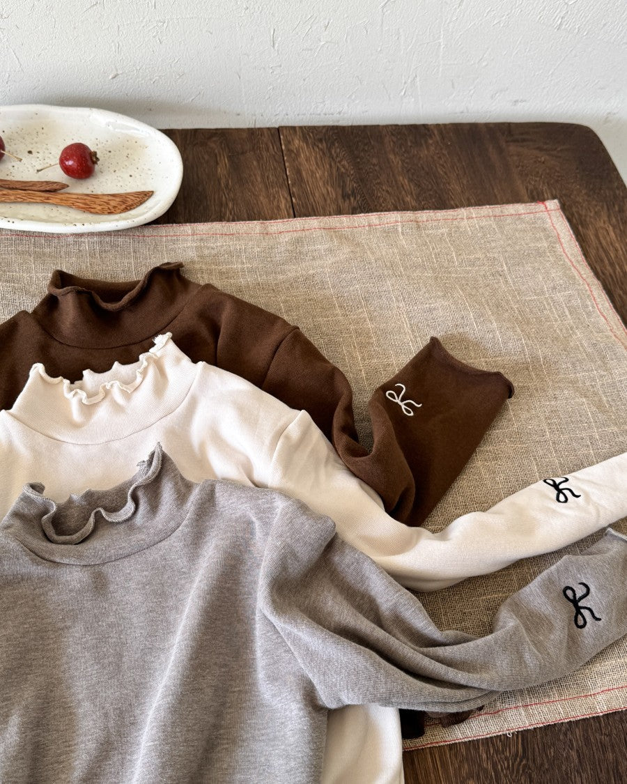 リボンステッチスムースメロウトップス