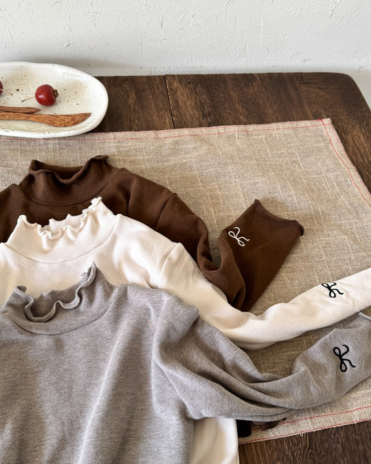 リボンステッチスムースメロウトップス