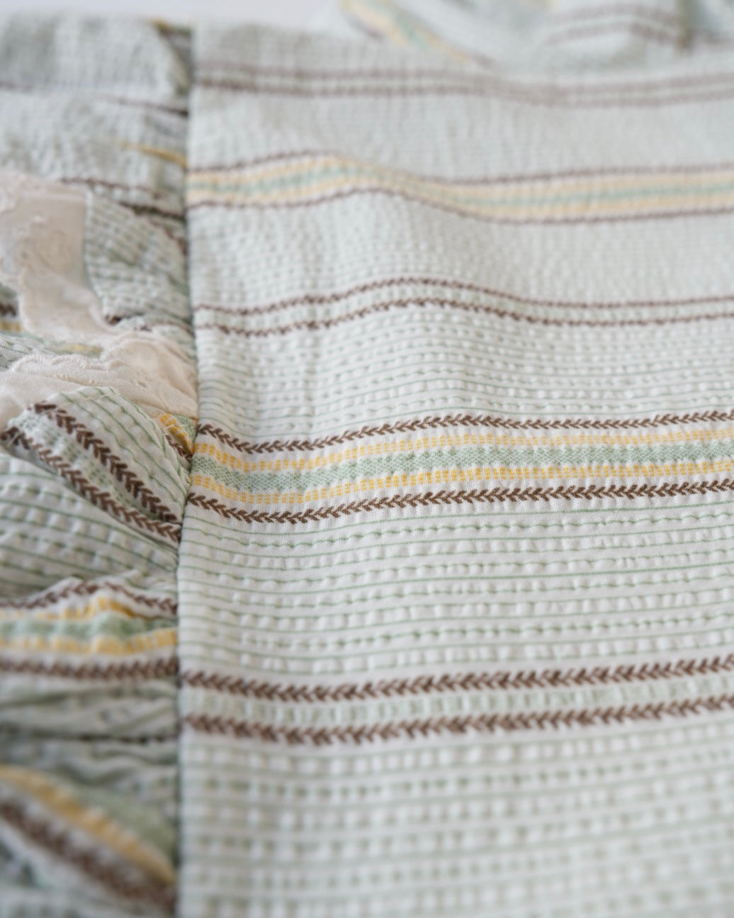 マルチストライプリンクルロンパース