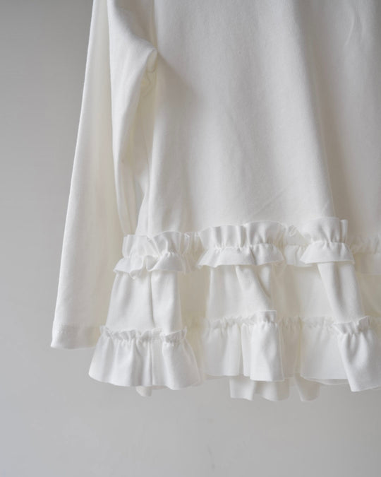 裾フリルトップス