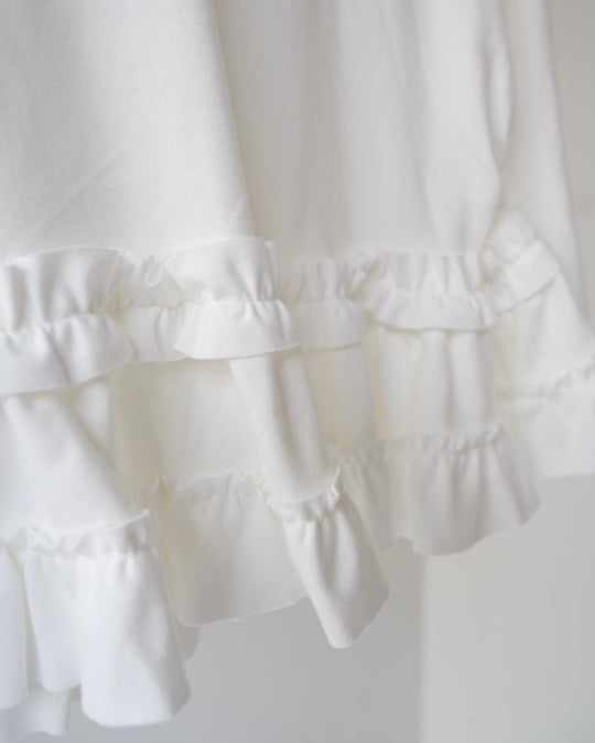 裾フリルトップス