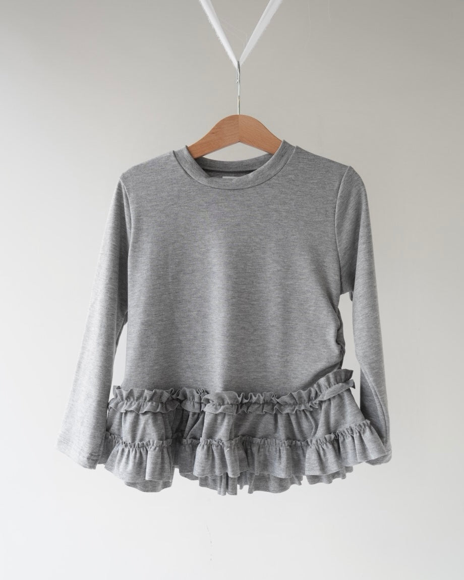 裾フリルトップス