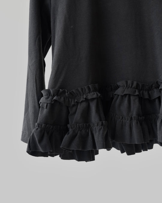 裾フリルトップス
