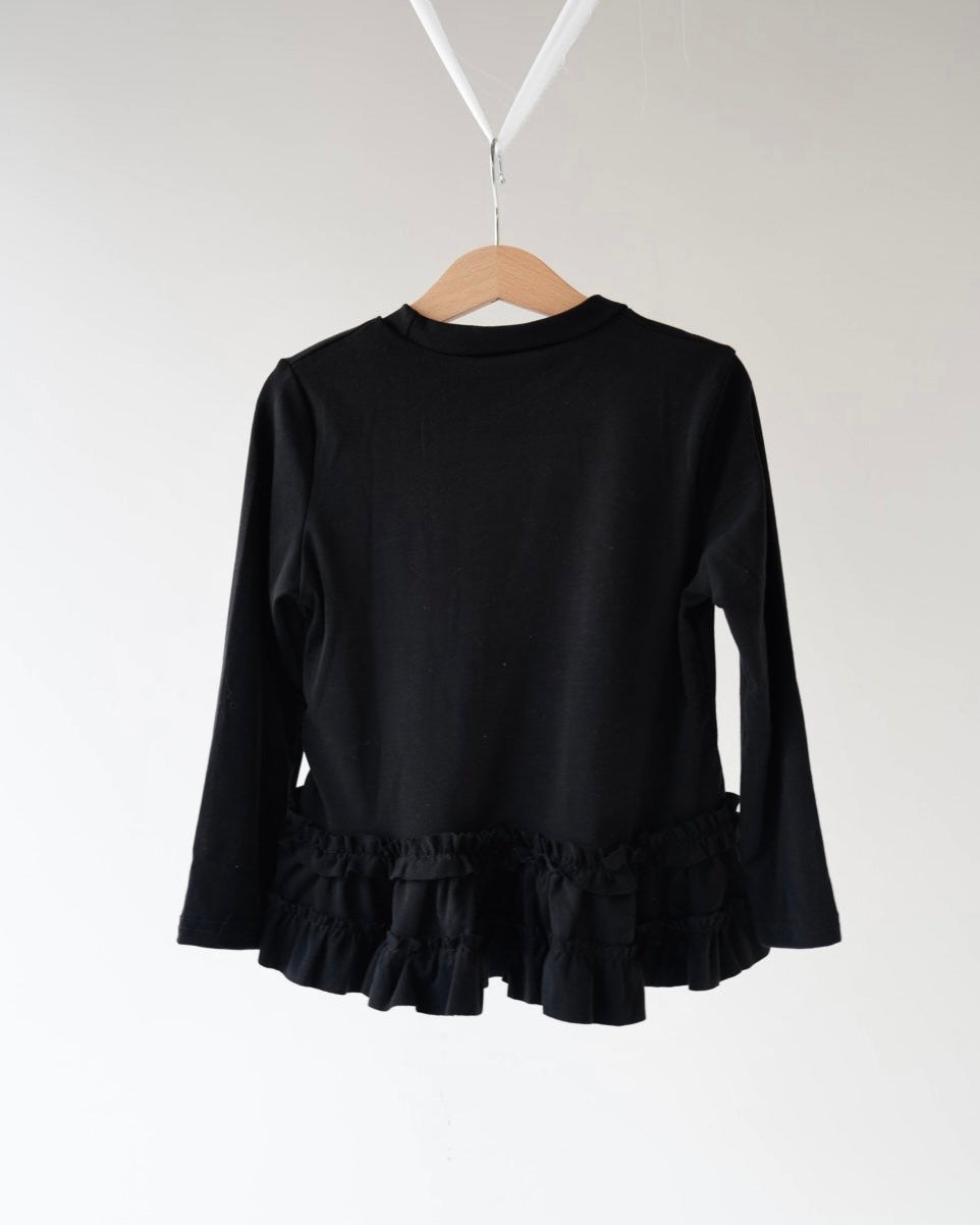 裾フリルトップス