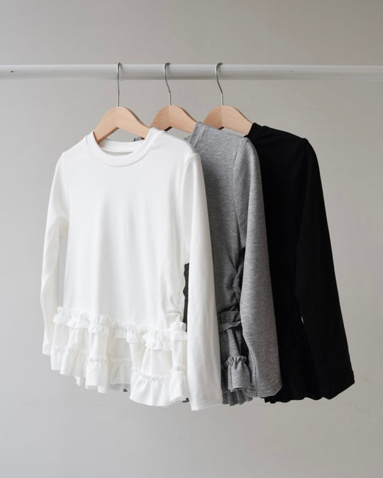 裾フリルトップス