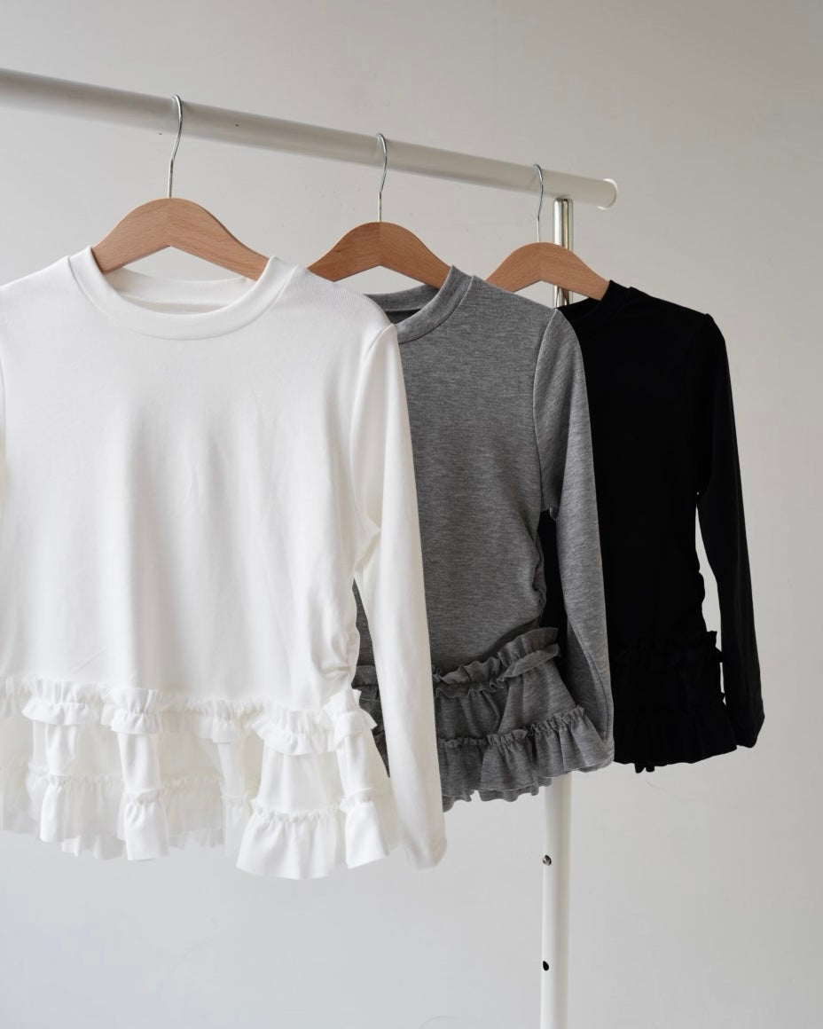 裾フリルトップス