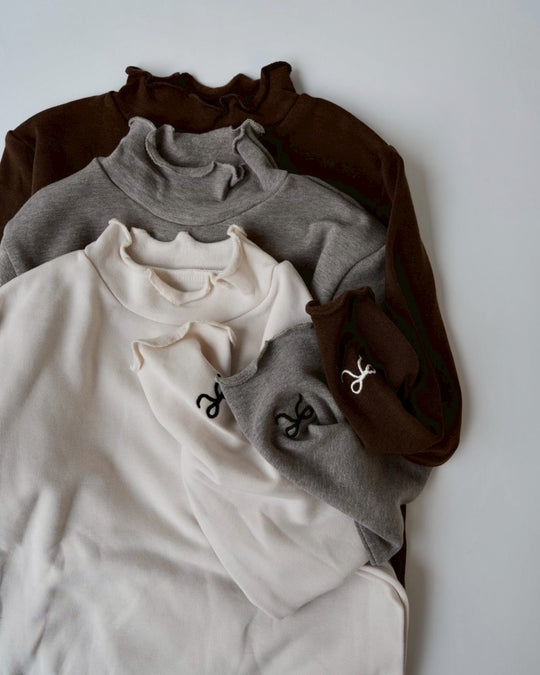 リボンステッチスムースメロウトップス